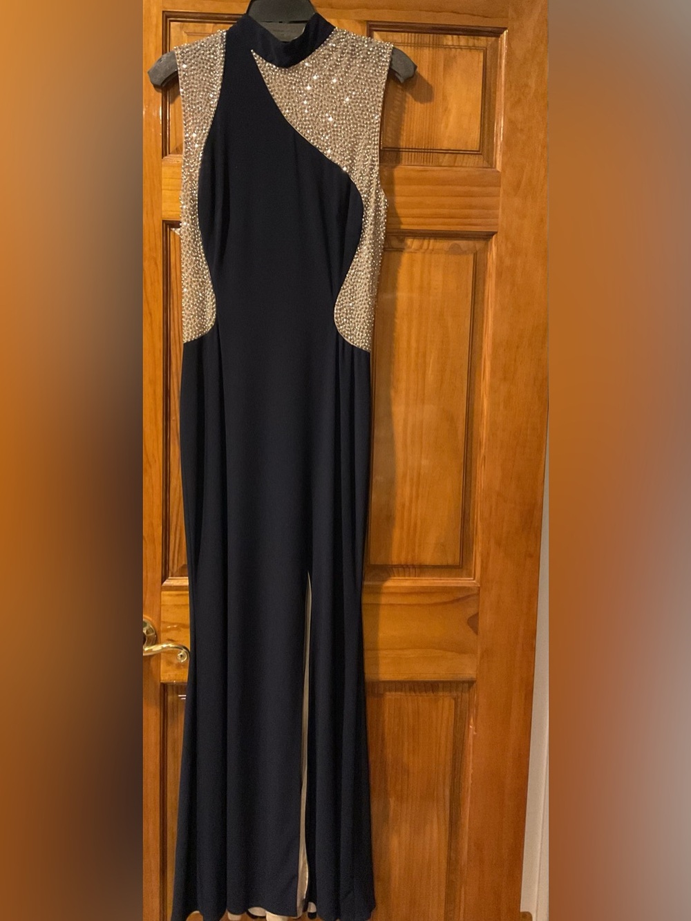 Xscape - Sleeveless Navy blue gown  with gold Embellished Side Panels